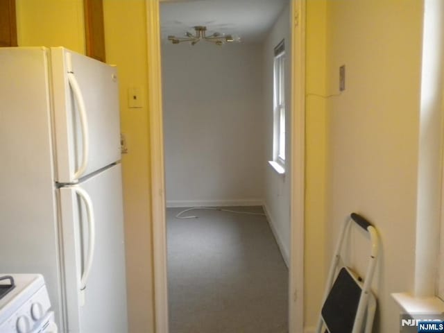 100 Huguenot Ave Unit 1B, Englewood, NJ 07631 - kitchen featuring freestanding refrigerator, carpet, and stove