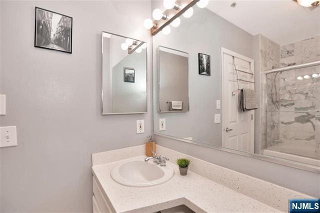 330 The Promenade, Edgewater, NJ 07020 - full bath featuring a marble finish shower and vanity