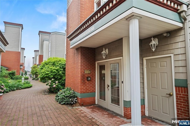 330 The Promenade, Edgewater, NJ 07020 - entrance to property featuring brick siding and french doors