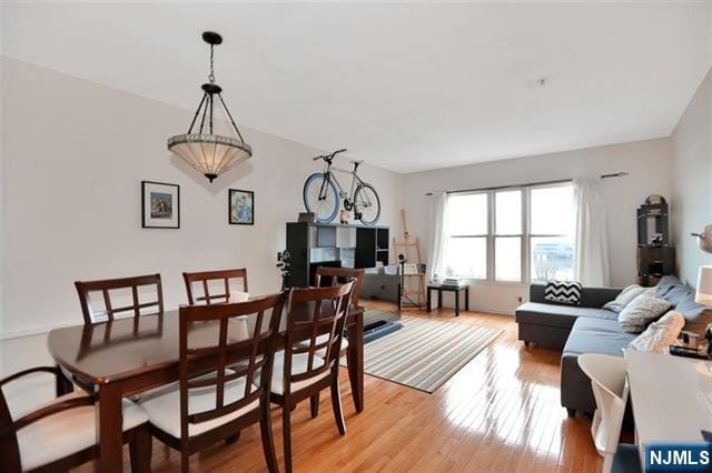 330 The Promenade, Edgewater, NJ 07020 - dining space with light wood-style floors