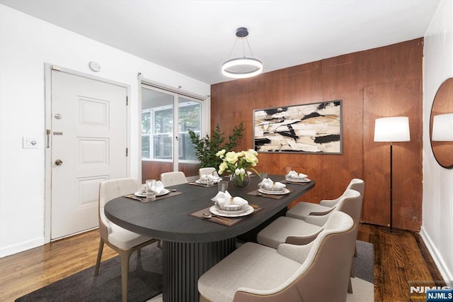 243 Lafayette Ave, Passaic, NJ 07055 - dining area with wood finished floors and wood walls