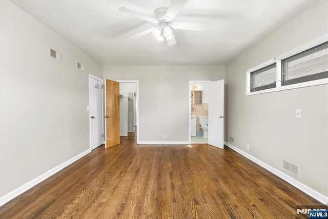 243 Lafayette Ave, Passaic, NJ 07055 - unfurnished bedroom with wood finished floors, a walk in closet, ensuite bath, and a ceiling fan