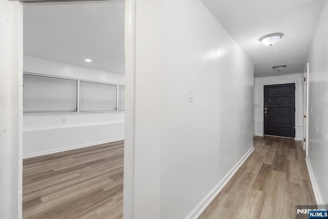 243 Lafayette Ave, Passaic, NJ 07055 - corridor with wood finished floors and baseboards