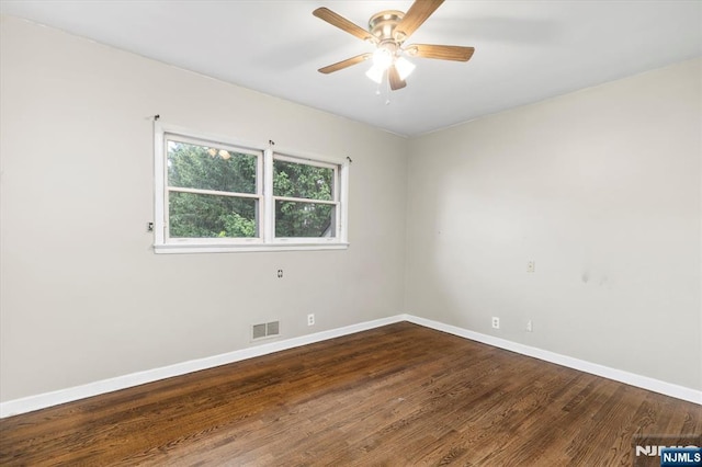 243 Lafayette Ave, Passaic, NJ 07055 - empty room with wood finished floors and a ceiling fan