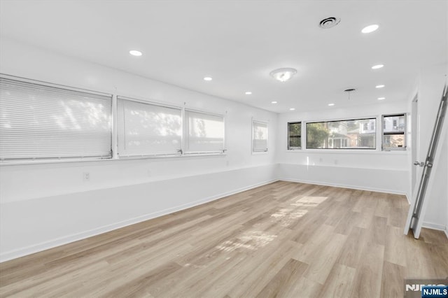 243 Lafayette Ave, Passaic, NJ 07055 - spare room with light wood-style floors and recessed lighting