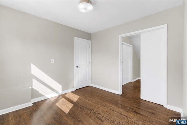 243 Lafayette Ave, Passaic, NJ 07055 - spare room featuring wood finished floors and baseboards