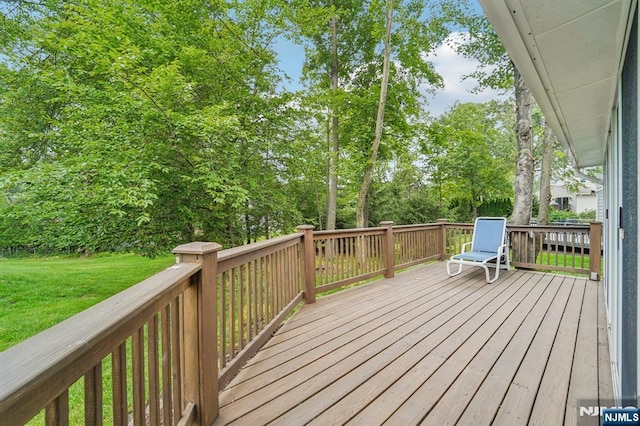 30 Sinclair Dr, Wayne, NJ 07470 - wooden deck featuring a lawn and view of scattered trees