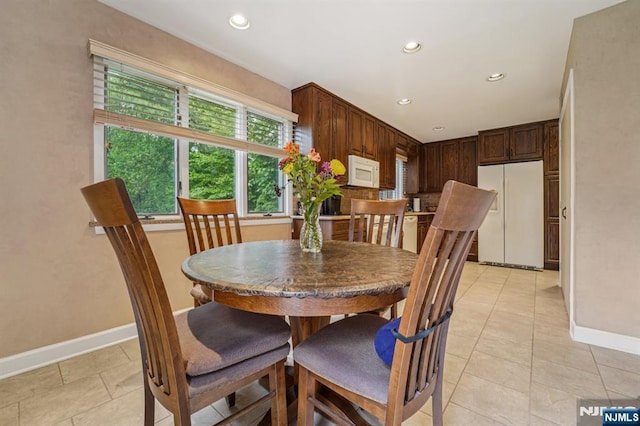 30 Sinclair Dr, Wayne, NJ 07470 - dining space with recessed lighting and light tile patterned flooring