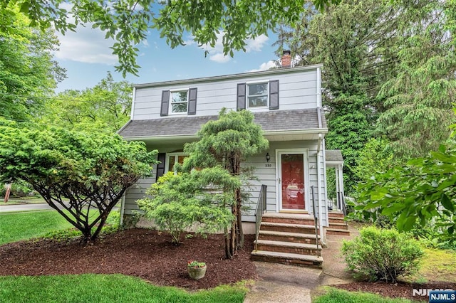 330 Vesta Ct, Ridgewood, NJ 07450 - view of front of property with roof with shingles and a chimney