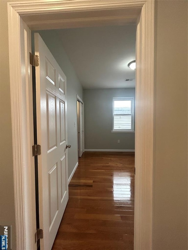 61 Grove, East Orange, NJ 07017 - corridor featuring dark wood finished floors and baseboards