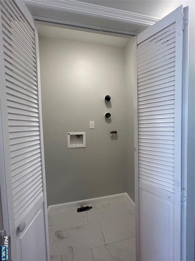 61 Grove, East Orange, NJ 07017 - laundry area with marble look tile flooring and washer hookup