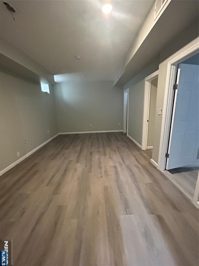 61 Grove, East Orange, NJ 07017 - empty room with wood finished floors and baseboards