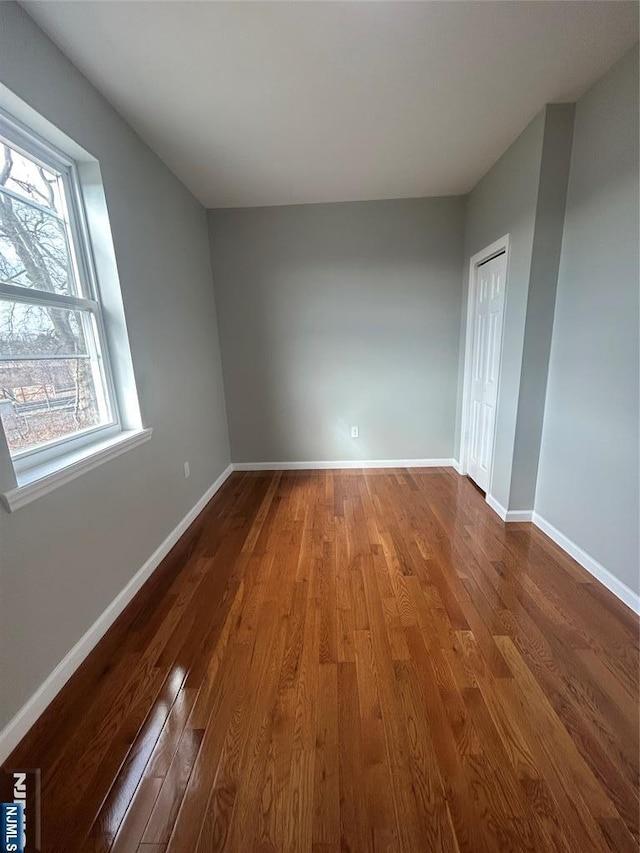 61 Grove, East Orange, NJ 07017 - empty room featuring wood finished floors and baseboards