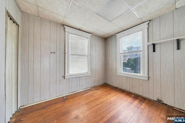 407 Elm St, Kearny, NJ 07032 - unfurnished room with wood-type flooring and wooden walls
