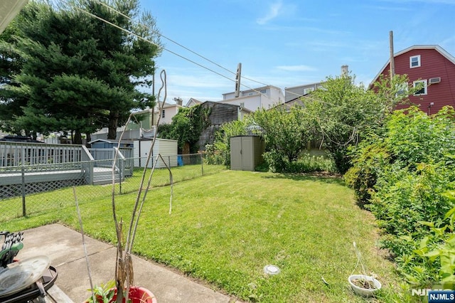 407 Elm St, Kearny, NJ 07032 - view of yard featuring a storage unit and a patio