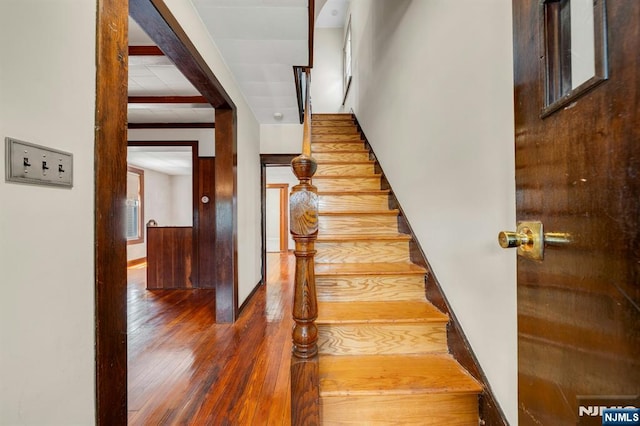 407 Elm St, Kearny, NJ 07032 - stairs with hardwood / wood-style flooring and baseboards