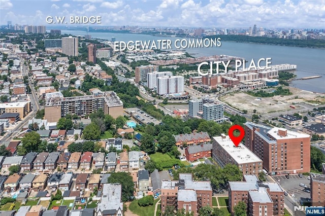 9019 Wall St Unit 6B, North Bergen, NJ 07047 - aerial overview of property's location with nearby urban area and a nearby body of water