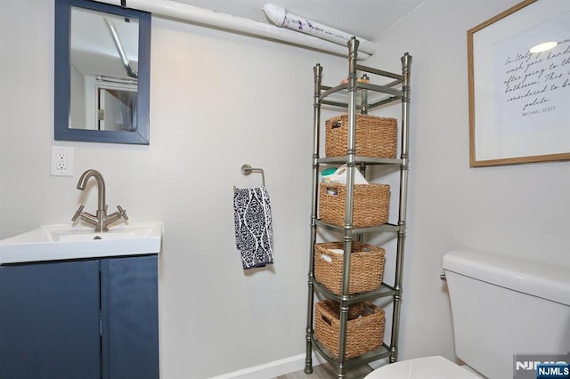 393 High St, Nutley, NJ 07110 - half bathroom featuring toilet and vanity
