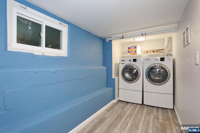 393 High St, Nutley, NJ 07110 - washroom featuring washing machine and clothes dryer and light wood-style floors