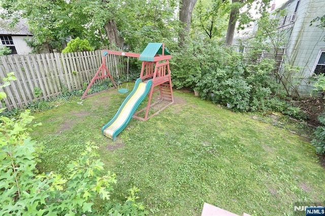 393 High St, Nutley, NJ 07110 - view of jungle gym with a fenced backyard