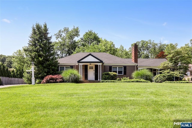 19 Mountain Rdg, Wayne, NJ 07470 - ranch-style house with a front lawn and a chimney