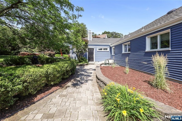 19 Mountain Rdg, Wayne, NJ 07470 - view of front of house with a chimney