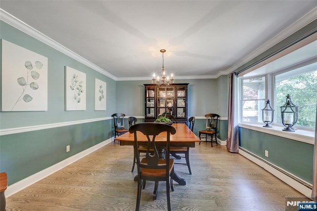 19 Mountain Rdg, Wayne, NJ 07470 - dining area with a baseboard radiator, crown molding, a chandelier, and wood finished floors