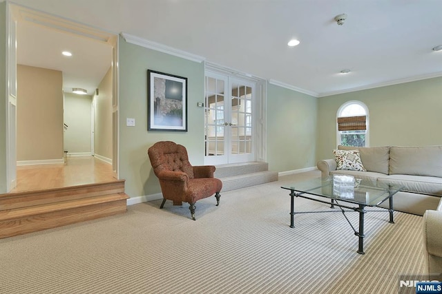 152 Highwood Ave, Tenafly, NJ 07670 - living area with ornamental molding, french doors, carpet, and recessed lighting