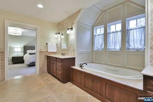 152 Highwood Ave, Tenafly, NJ 07670 - full bath featuring vanity, healthy amount of natural light, tile patterned floors, a garden tub, and recessed lighting