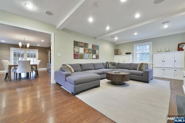 152 Highwood Ave, Tenafly, NJ 07670 - living area with beamed ceiling, dark wood-style flooring, a chandelier, and recessed lighting