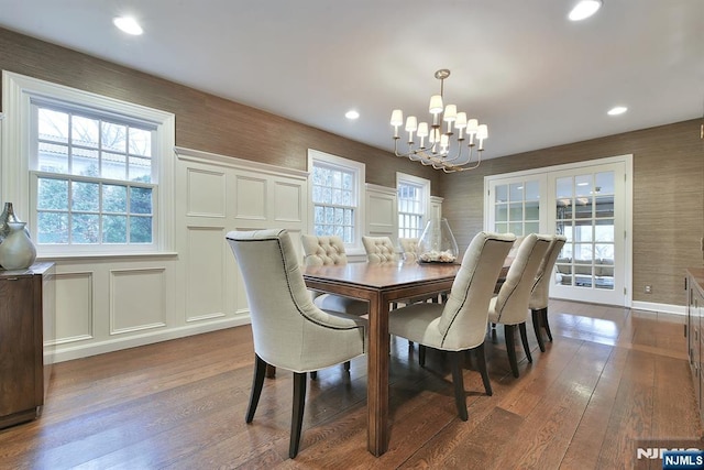 152 Highwood Ave, Tenafly, NJ 07670 - dining room with a chandelier, wood finished floors, wallpapered walls, recessed lighting, and a decorative wall