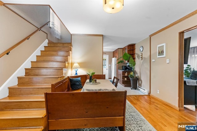 159 Oak Ridge Rd, West Milford, NJ 07438 - staircase with wood finished floors, crown molding, and baseboard heating