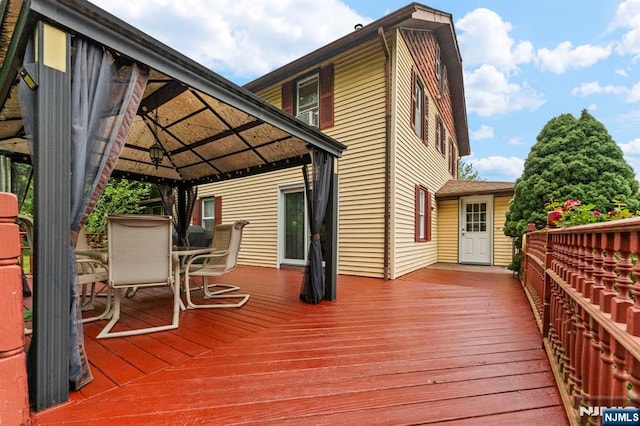 159 Oak Ridge Rd, West Milford, NJ 07438 - wooden terrace featuring a gazebo and outdoor dining space