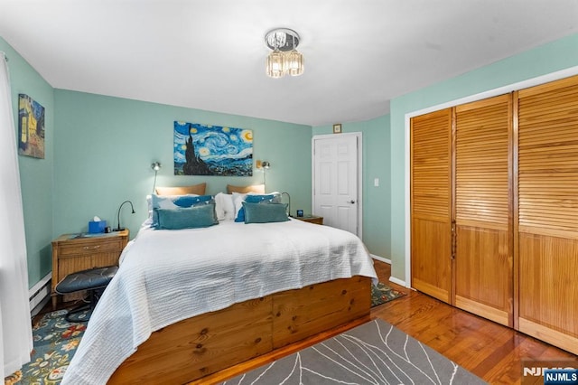 159 Oak Ridge Rd, West Milford, NJ 07438 - bedroom featuring a closet, wood finished floors, and baseboard heating