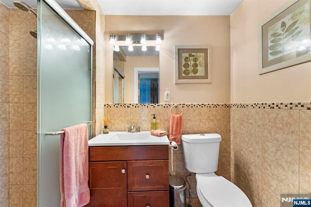 159 Oak Ridge Rd, West Milford, NJ 07438 - bathroom with tile walls, a shower stall, and vanity