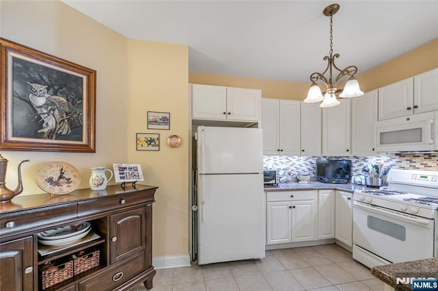 7108 Ravenscroft Rd Unit 555, Clifton, NJ 07013 - kitchen with white appliances, white cabinetry, a chandelier, and decorative backsplash