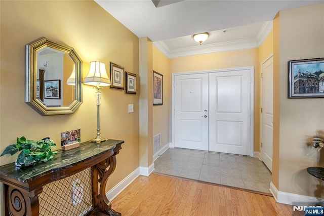7108 Ravenscroft Rd Unit 555, Clifton, NJ 07013 - foyer featuring ornamental molding and light wood finished floors