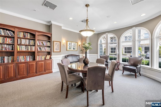 7108 Ravenscroft Rd Unit 555, Clifton, NJ 07013 - dining room featuring light colored carpet, recessed lighting, healthy amount of natural light, ornamental molding, and wainscoting