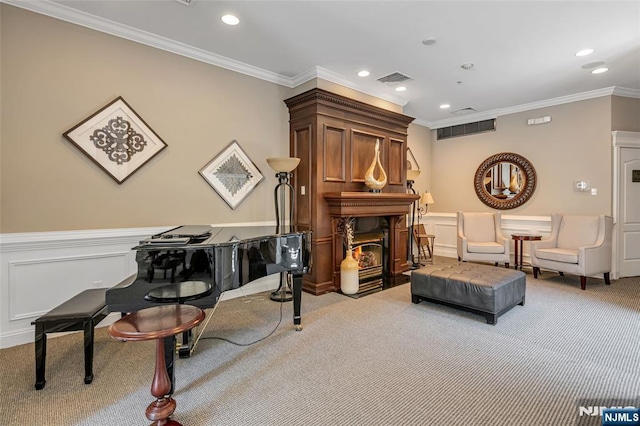 7108 Ravenscroft Rd Unit 555, Clifton, NJ 07013 - sitting room with light carpet, recessed lighting, ornamental molding, a decorative wall, and a wainscoted wall
