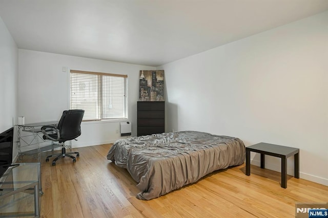 1 Columbus Pl, Cliffside Park, NJ 07010 - bedroom with wood finished floors and an office area