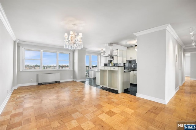 6600 Jfk Blvd E Unit 19Land19K, West New York, NJ 07093 - kitchen with radiator, ventilation hood, a chandelier, ornamental molding, and open floor plan