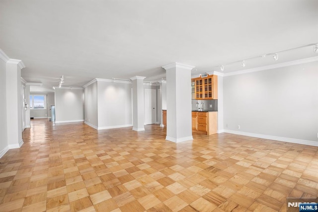 6600 Jfk Blvd E Unit 19Land19K, West New York, NJ 07093 - unfurnished living room with bar with sink, ornamental molding, and track lighting