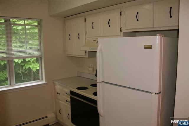 41 N Franklin Tpke Unit O, Ramsey, NJ 07446 - kitchen featuring white appliances, custom exhaust hood, a baseboard heating unit, white cabinets, and light countertops