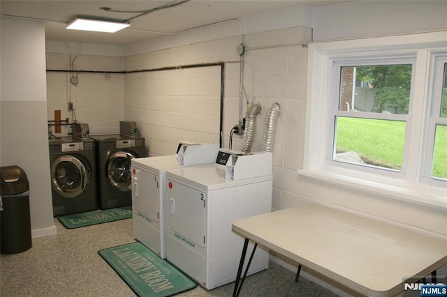 41 N Franklin Tpke Unit O, Ramsey, NJ 07446 - communal laundry room with washing machine and clothes dryer, plenty of natural light, and concrete block wall