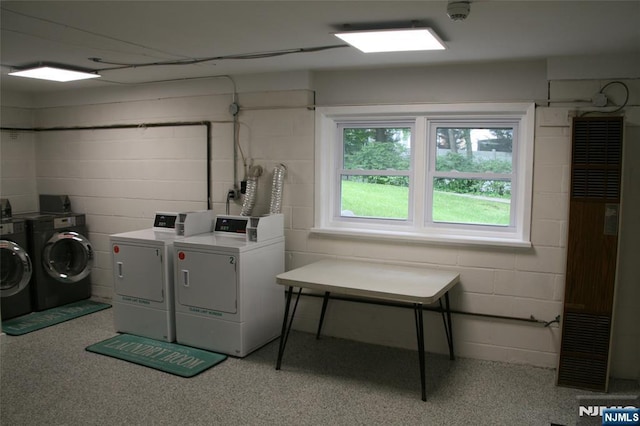 41 N Franklin Tpke Unit O, Ramsey, NJ 07446 - community laundry room with washer and dryer, a heating unit, and concrete block wall
