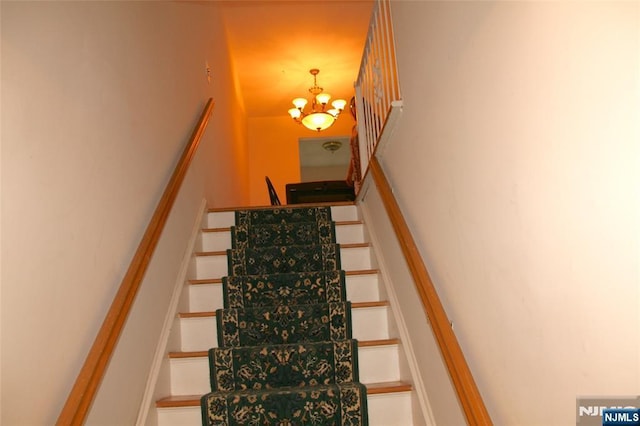 41 N Franklin Tpke Unit O, Ramsey, NJ 07446 - stairs featuring a chandelier