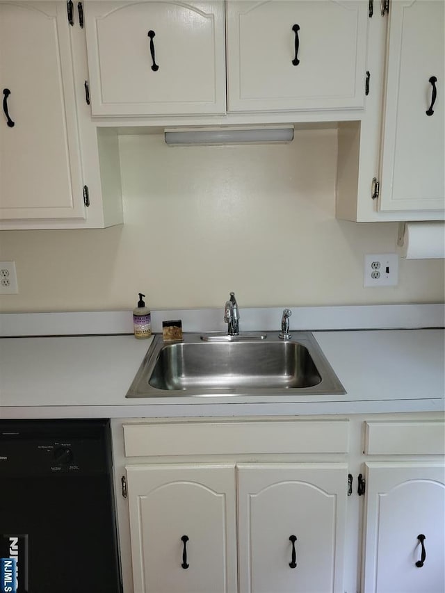 41 N Franklin Tpke Unit O, Ramsey, NJ 07446 - kitchen with black dishwasher, white cabinets, and light countertops