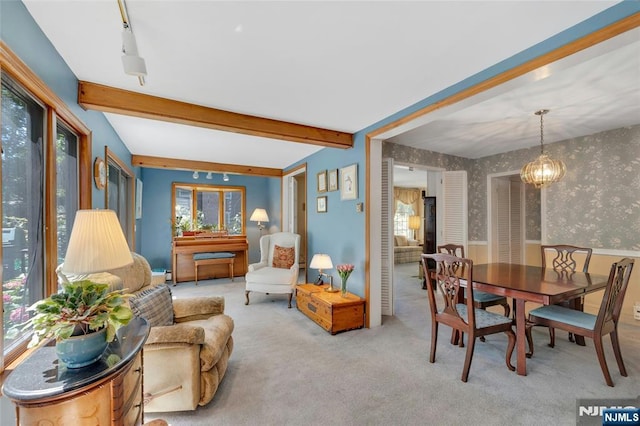 486 Summit Ave, Oradell, NJ 07649 - carpeted dining room with plenty of natural light, wallpapered walls, beamed ceiling, a chandelier, and a wainscoted wall