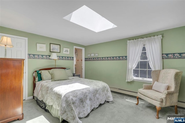 486 Summit Ave, Oradell, NJ 07649 - carpeted bedroom featuring a baseboard heating unit and a skylight