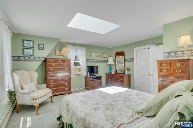 486 Summit Ave, Oradell, NJ 07649 - bedroom with a skylight, baseboard heating, and carpet